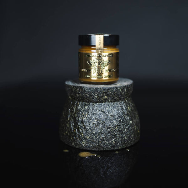 Primal by Nature UMF 32+ MGO 1835+ Certified Manuka Honey Jar on Stone Pedestal